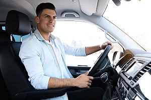 Happy driver with auto insurance 