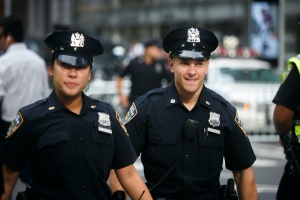 two officers that have police liability insurance