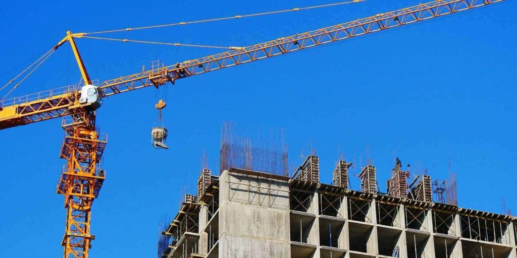 building construction site against blue sky