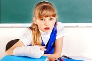 School Accident Insurance small girl with fractured arm