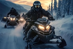 a group of people on snowmobiles