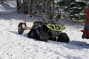 rescue snowmobile in winter