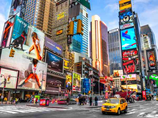 Times Square ,is a busy tourist intersection of neon art and commerce and is an iconic street of New York City and America