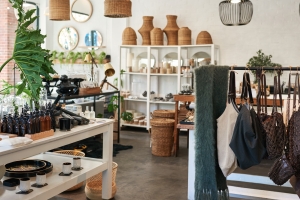 Interior of a stylish boutique full of an assortment of housewares, bags and accessories for sale